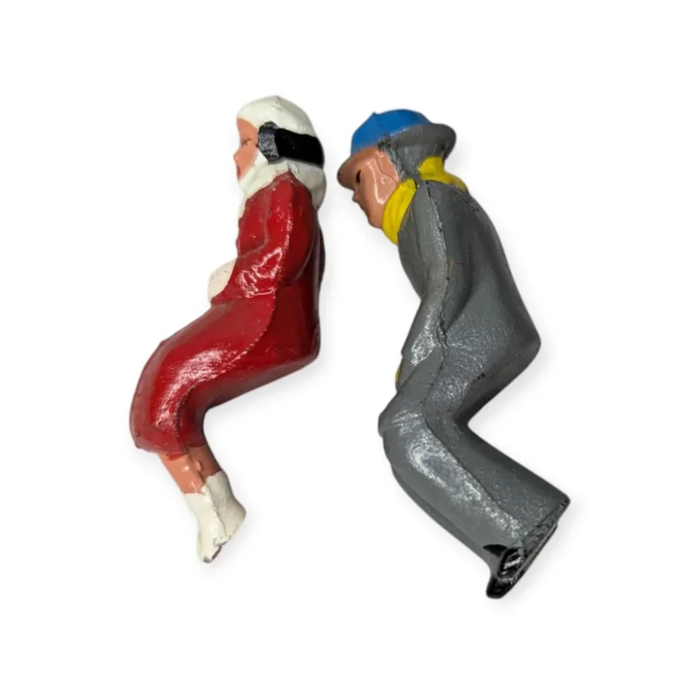Vintage Winter Scene Metal Seated Figures Man and Woman Set of 2 2.5